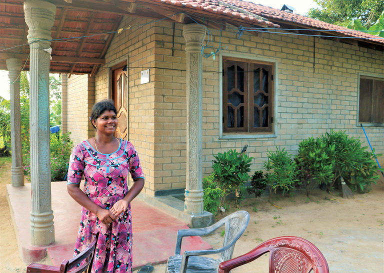 Homes Built By Homeowners In Sri Lanka FuturArc   Thushanthini Outside Her Home Built With Compressed Stabilized Earth Blocks In Sri Lanka 768x546 